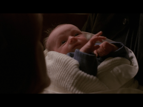 It's either a benediction or he's throwing gang signs.